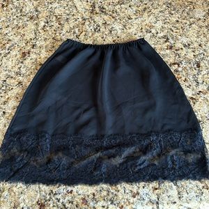 Black slip with lace trim. Size M.
